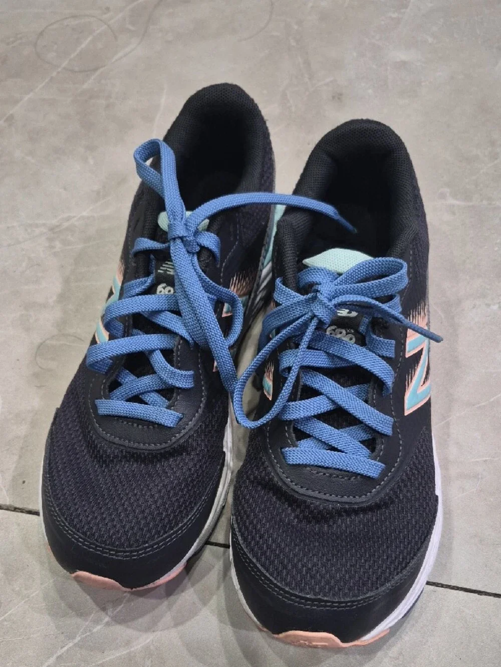 New Balance Women's Black Athletic Sneakers with Blue Laces and Peach Accents